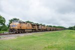UP 5305 leads a coal train west on the Wagoner Sub